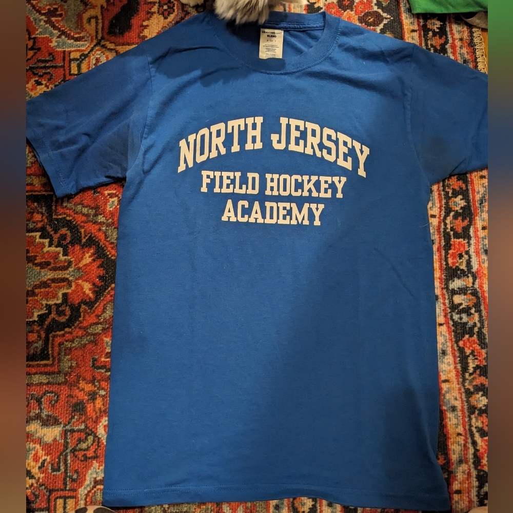 Royal blue north jersey field hockey academy tee. Women's small